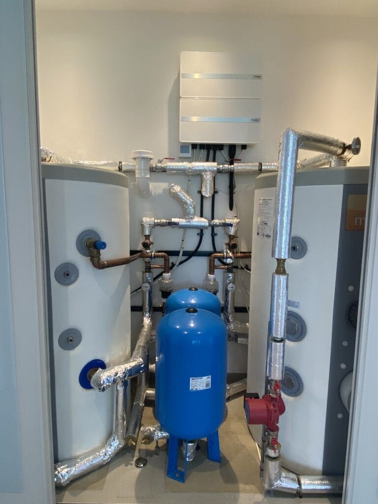 Commercial plumbing and heating engineer working at a Long Stratton mixed-use premises